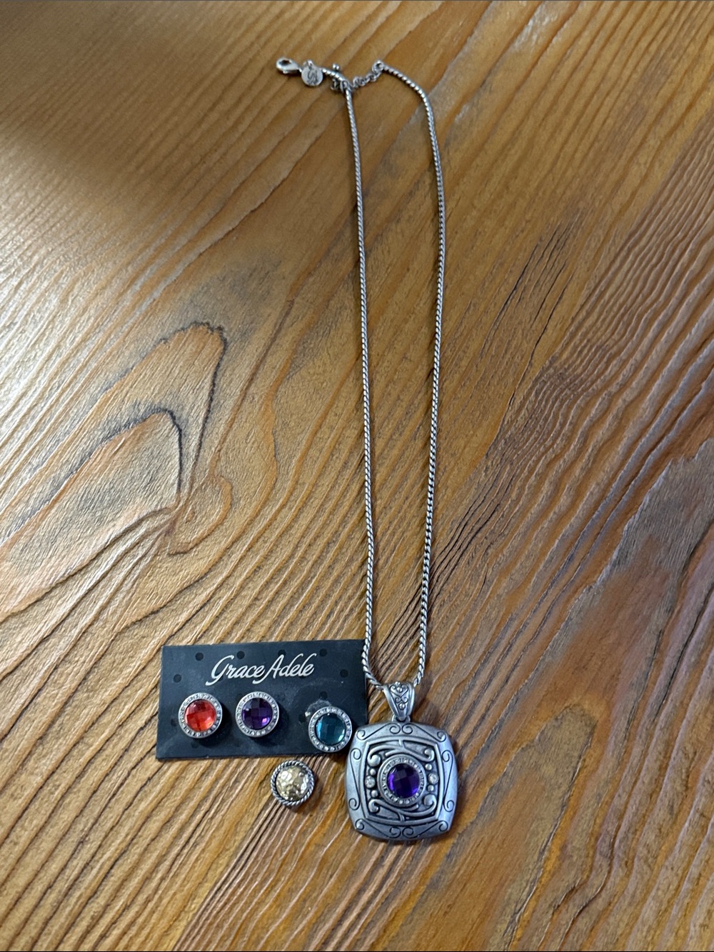 Grace Adele Silver-Tone Pendant Necklace with Purple Center Stone
